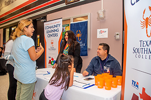 Texas Southmost College’s 21st Century Community Learning Centers staff talk to parents and students Sept. 30, 2019 about educational opportunities at TSC.